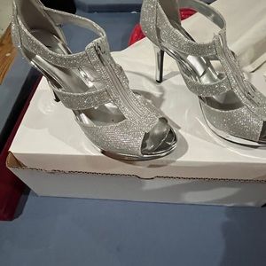 Silver spike heels. Brand new and in new tcondition
